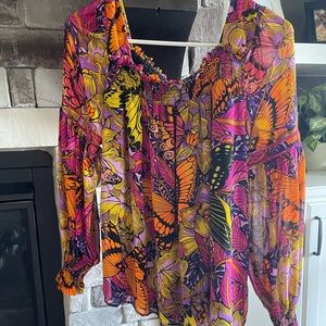 Cute, colorful top from Anthropology. Worn once. Brand new condition.